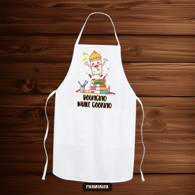 Funny Apron: A joyful paintbrush character leaps over colorful art supplies, offering humorous protection for energetic artists.