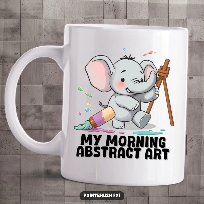Funny mug showing a large, clumsy elephant tripping over a giant paintbrush, resulting in a comical explosion of colorful paint.