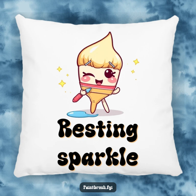 Funny pillow featuring a winking paintbrush followed by a trail of sparkly paint, offering cozy comfort with a playful, artistic touch.