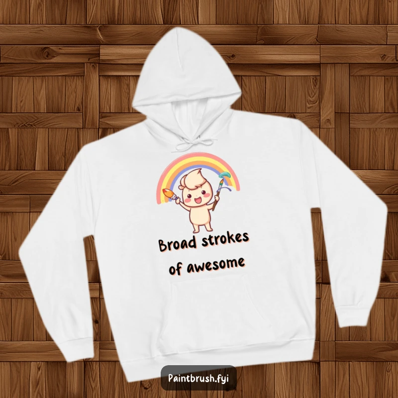 Funny Hoodie: An enthusiastic paintbrush character painting a rainbow, designed for cozy moments and creative inspiration.