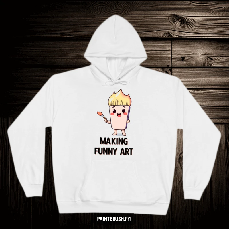 Funny paintbrush character with a contorted, amusing face on a comfortable hoodie, perfect for art enthusiasts.