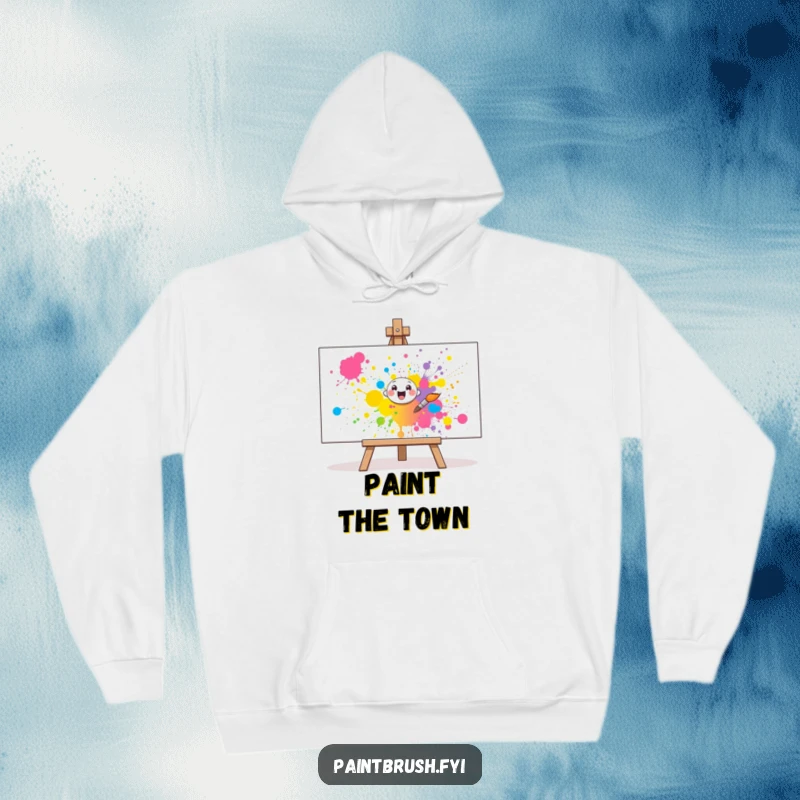 Funny Hoodie: A cheerful paintbrush character joyfully splatters vibrant paint onto a large canvas, offering cozy art vibes.