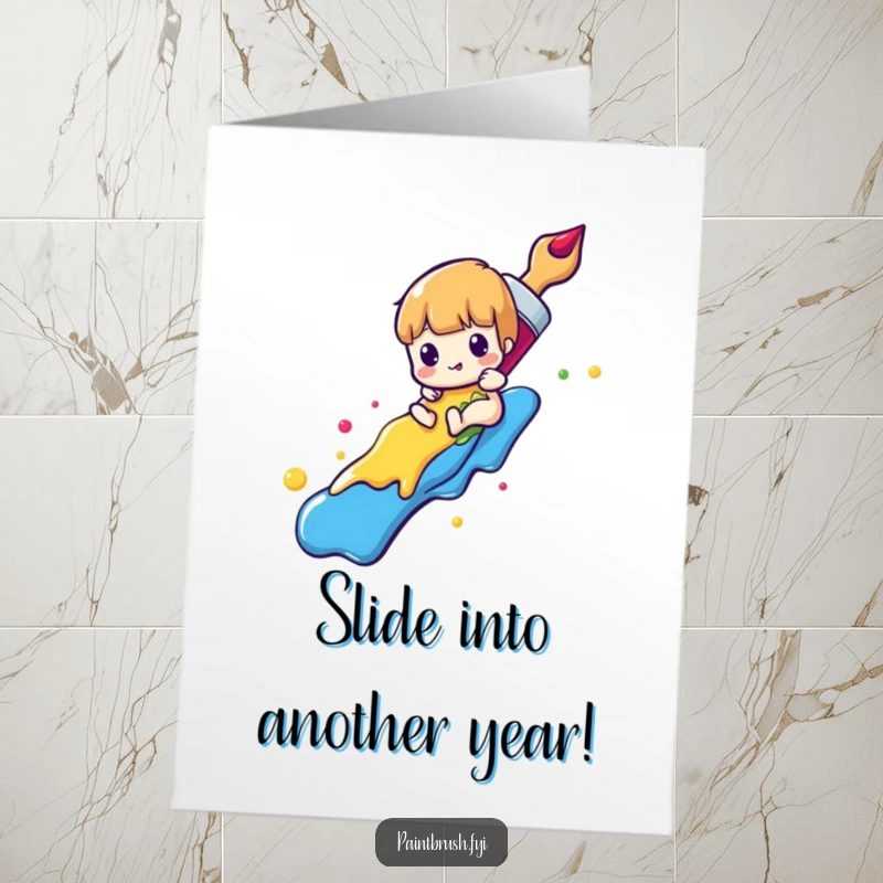 Funny Free Printable Birthday Card: A paintbrush character slides gleefully down a vibrant rainbow made of colorful paint, wishing happy birthday.
