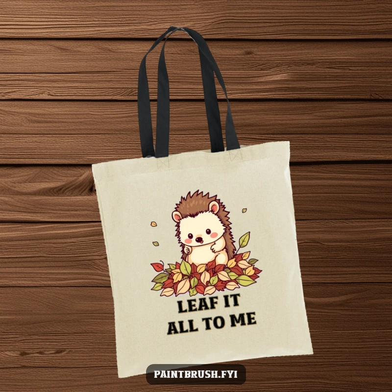 Funny tote bag with a neat hedgehog character tidying a pile of fallen leaves, great for shopping or carrying autumn finds.